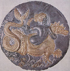 Lid of silver box with relief of Nereid riding a serpent. Late second century BC. Taranto, National Museum 22429